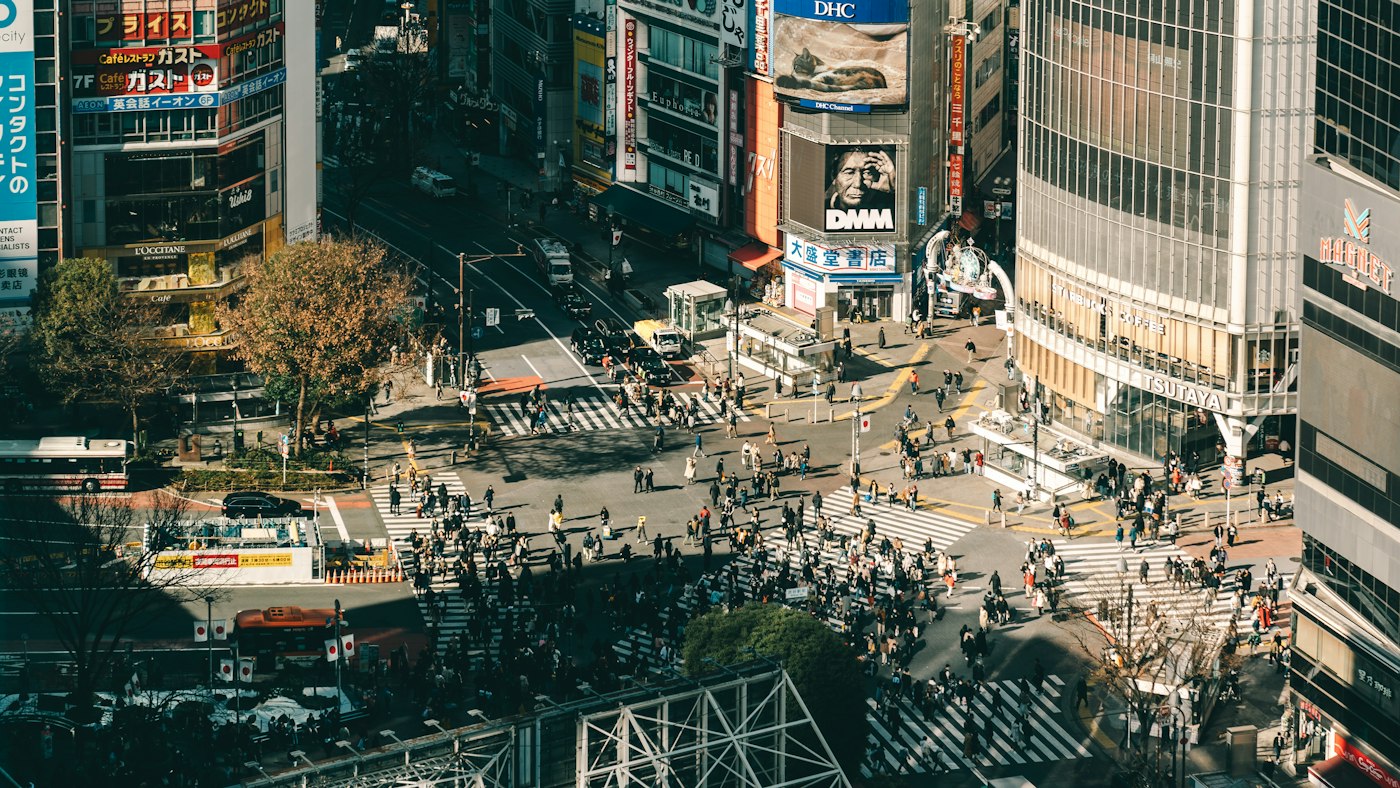 An urban crossing where everyday life and commerce meet